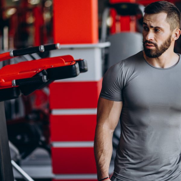 Strong man training in gym