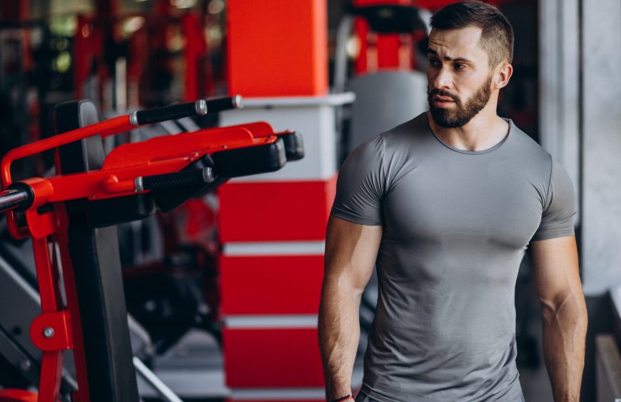 Strong man training in gym